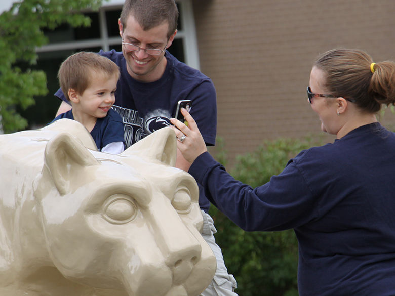 Penn State family enjoying the Lion Shrine