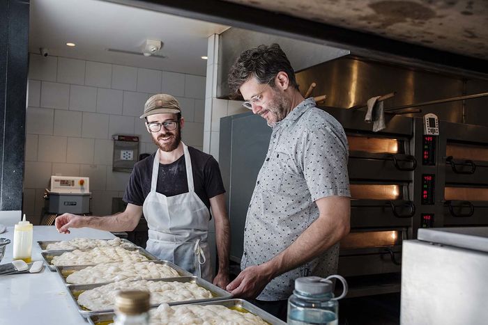 Joe Beddia and one if his chefs in the kitchen at Pizzeria Beddia