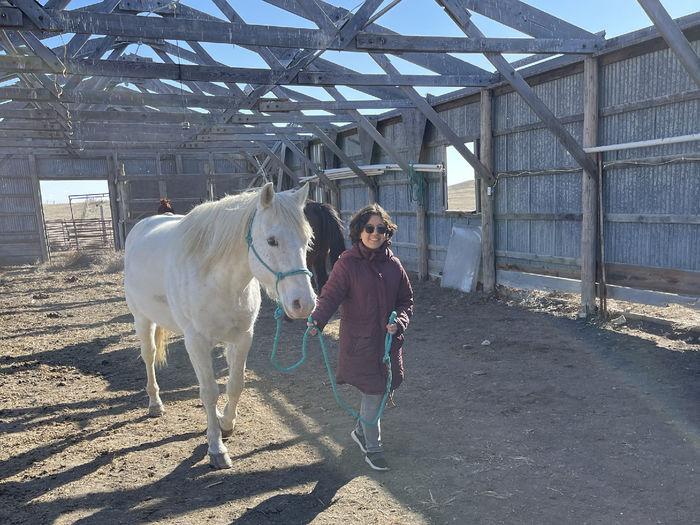 Berks student walks with a horse