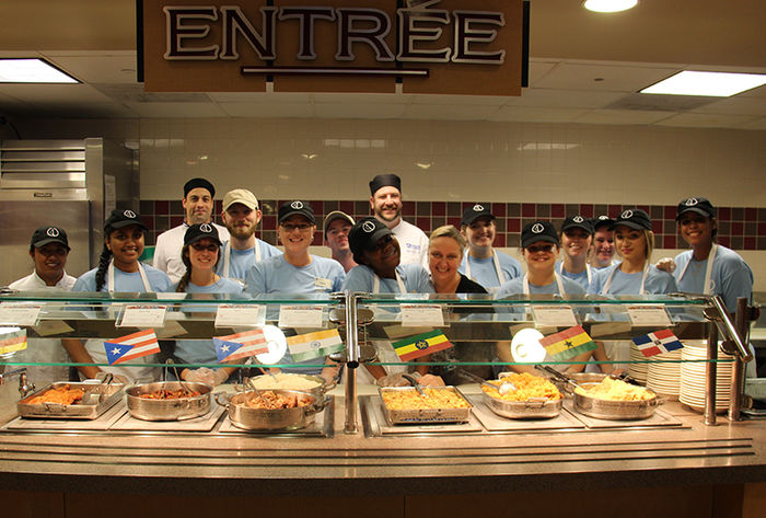 HM Student serve their dinner they prepared.