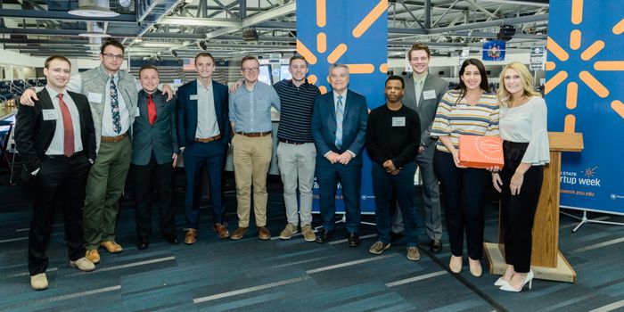 Penn State President Barron standing with student competitors of the 2019 Inc.U Competition