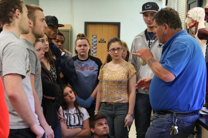 Students gather around John Long