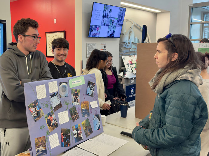 Students and community members viewed sustainability presentations. 