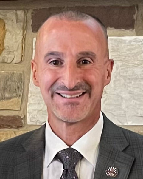 Dr. Joseph E. Macharola