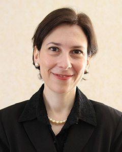 head shot of Rosario
