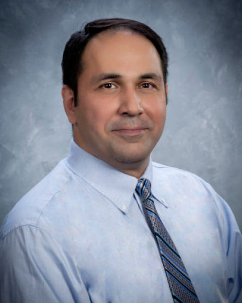 Shahid Khan headshot