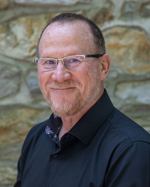 headshot of warren bair