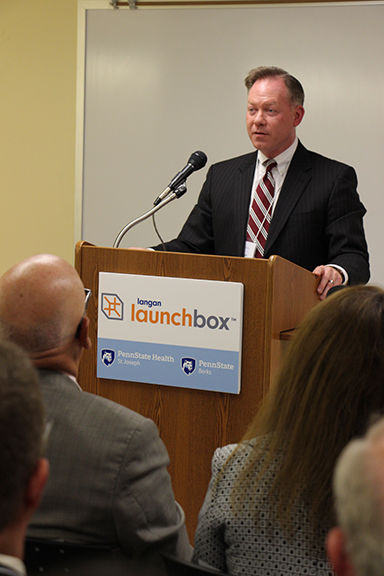 Randy speaking at ribbon cutting