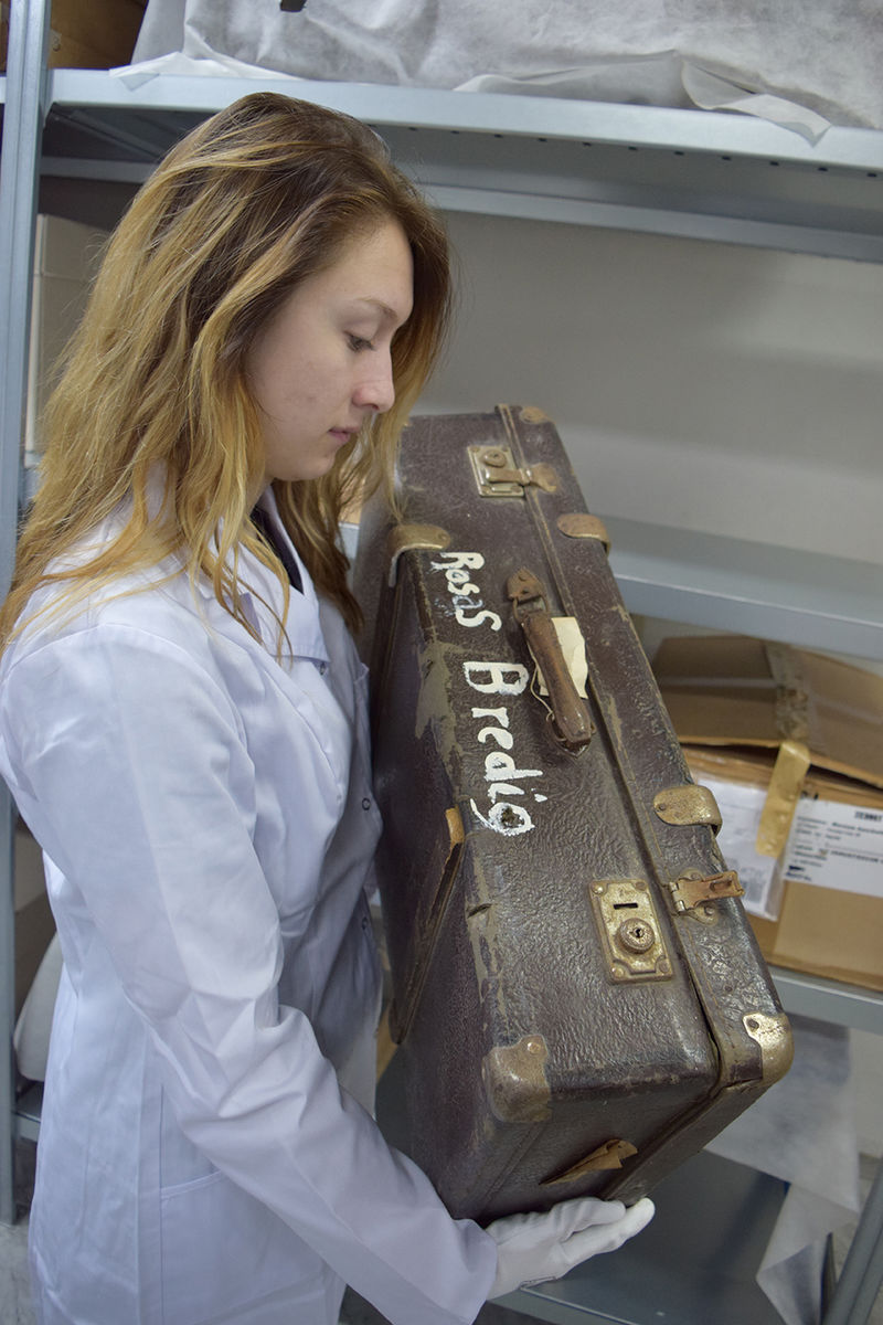 student with suitcase