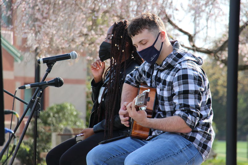Two students perform on stage at SpringFest, a musical event hosted by Berks Residence Life on April 23.