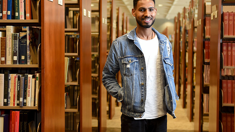 Rezene travels across the world to earn degree