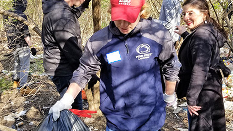 College partners with community for trail cleanup