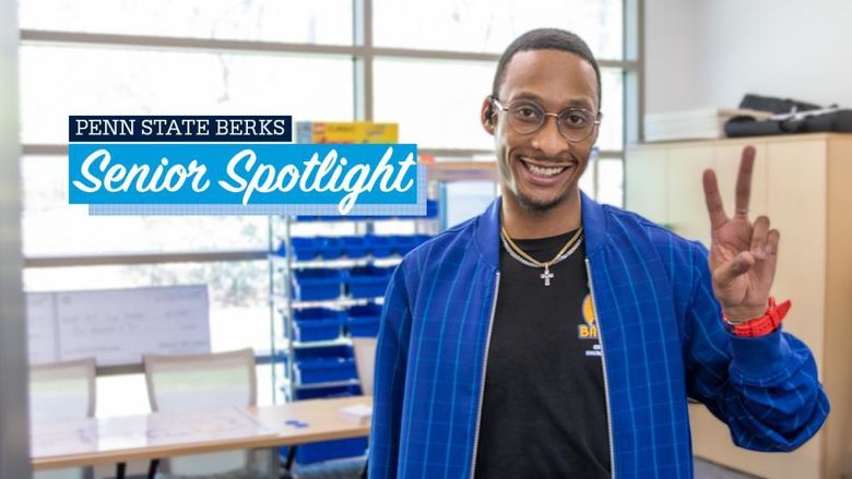 Brandon Everett holds up a peace sign with text reading "Penn State Berks Senior Spotlight" appearing over image