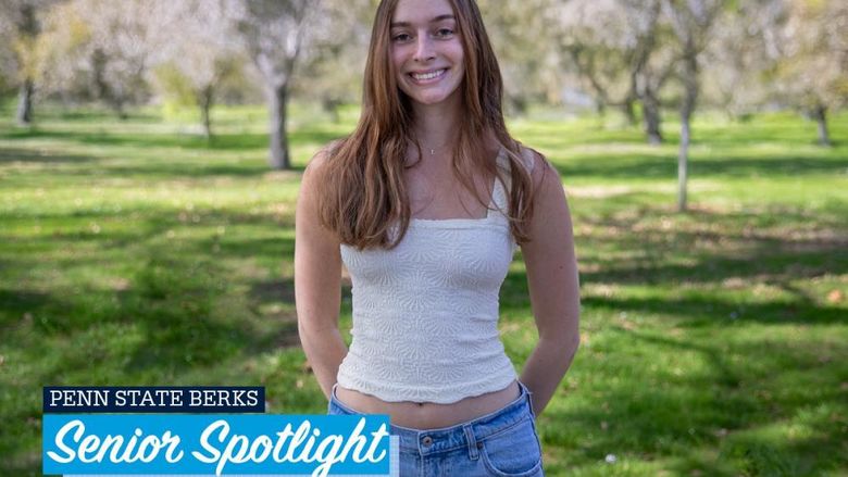 Isabella Romig standing outside on campus