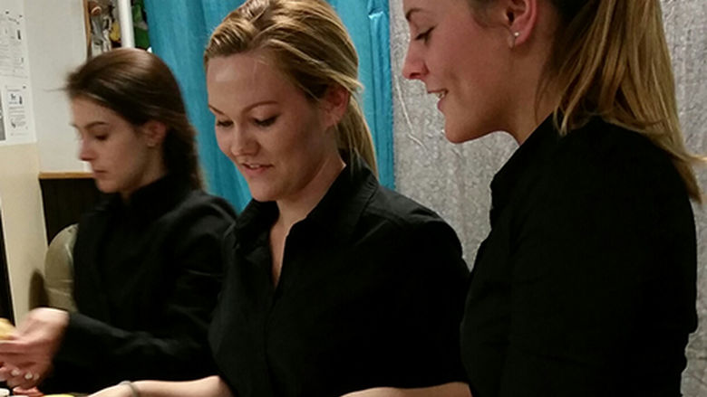 students serving dessert
