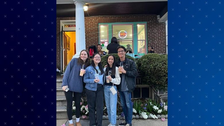 Students standing outside Winnie’s Tea Bar in West Reading