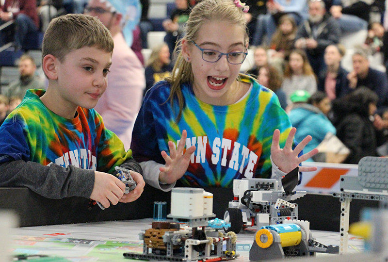 Smart Software team members Ryan Avram and Caylyn Hauser present their robot during the tournament. Smart Software team members Ryan Avram and Caylyn Hauser present their robot during the tournament.