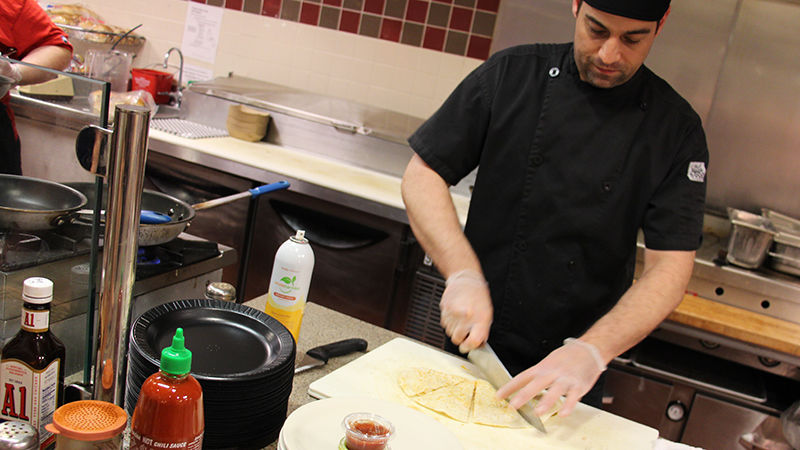Chef creating crepes Chef creating crepes