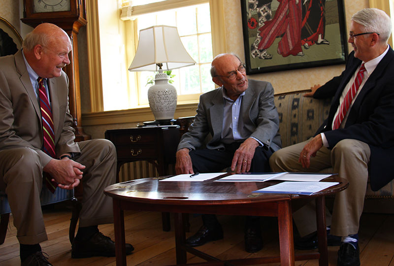Rolf Schmidt signs agreement to create a new scholarship. Rolf Schmidt signs agreement to create a new scholarship.