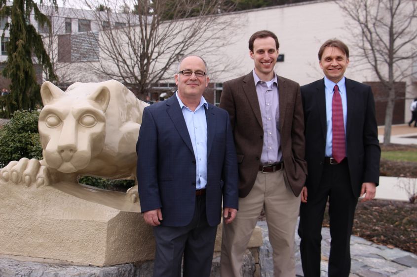 men in front of Lion