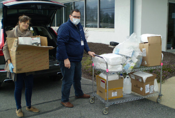 Lisa Weaver transferring a large donation of medical supplies. Lisa Weaver transferring a large donation of medical supplies.