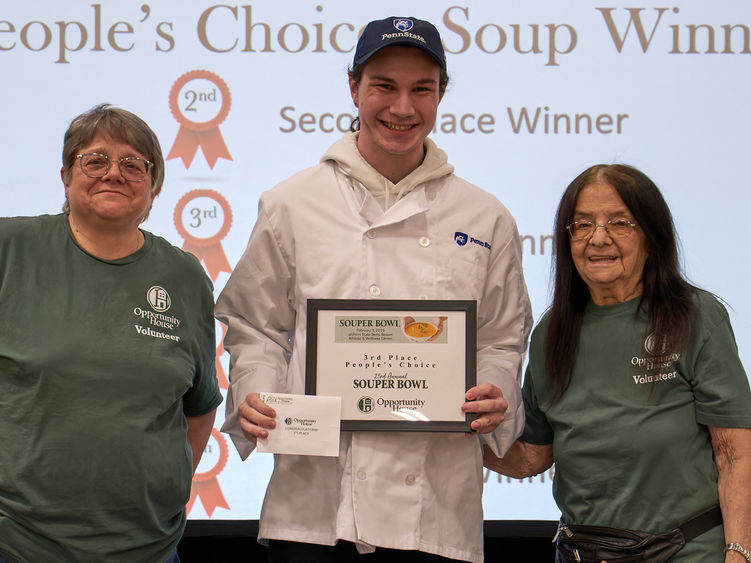 Student Souper Bowl winner is pictured with Food Services staff.